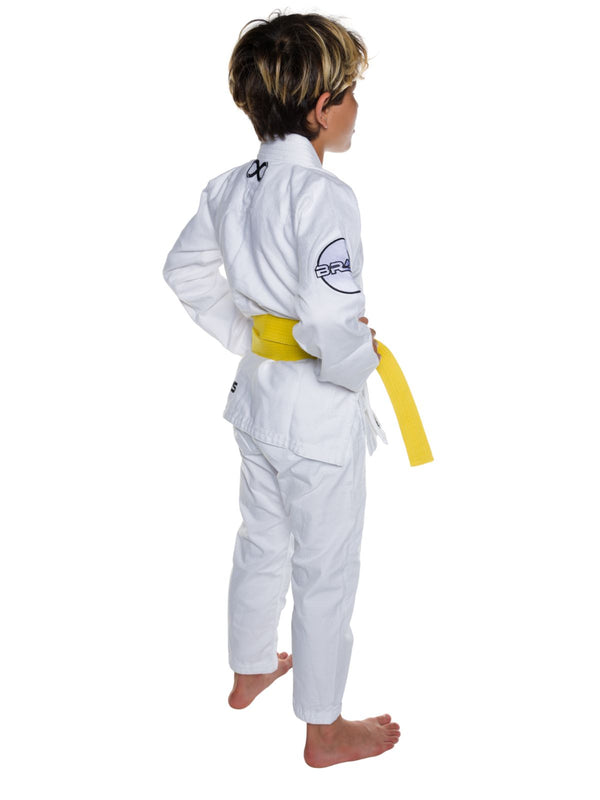 Child wearing a white martial arts uniform with a yellow belt on a white background